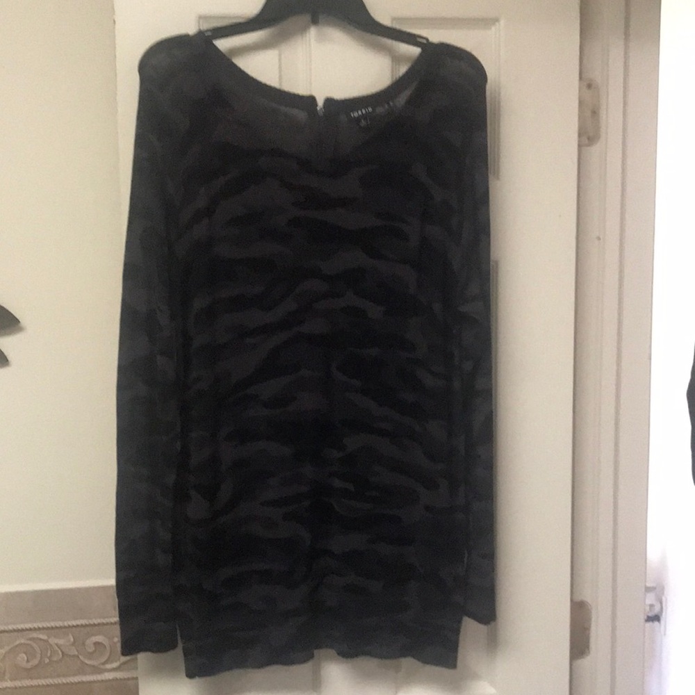 Light weight camouflage sweater.